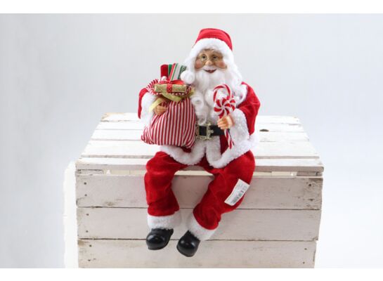 Mikołaj siedzący z workiem i lizakami 45 cm